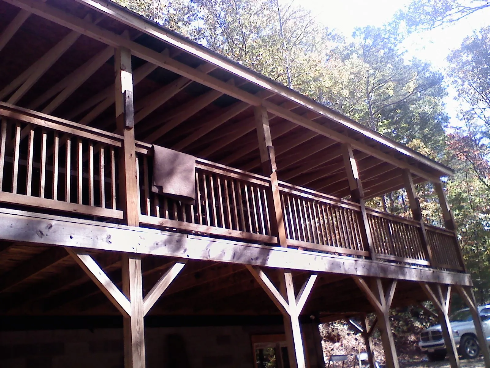 Timber framing under a new elevated porch and deck — Roof Leak Repair in Manitowoc by Roofing Brothers
